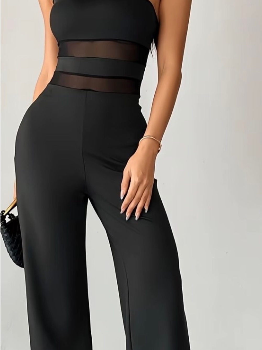 Sleek Black Wide-Leg Jumpsuit with Sheer Waist Panel